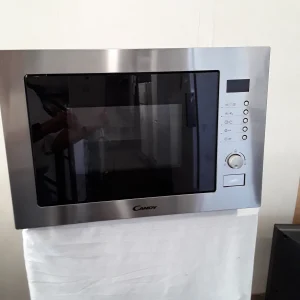 Micro-onde Encastrable Candy inox et noir - 20L - grade A